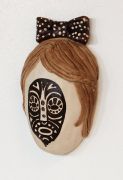 Exotic Souvenir ( Girl Face with hair bow and small mask) - 2017, Burned ceramics, Acrylic paint, lacquer, 18x10 cm Exotic Souvenir ( Girl Face with hair bow and small mask) - 2017, Burned ceramics, Acrylic paint, lacquer, 18x10 cm